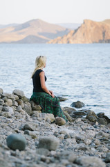 Girl enjoys the sea view