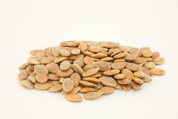 Pumpkin seeds isolated on the white background