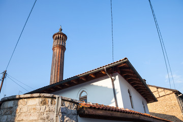 Old mosque with a wooden minaret taken in the older part of Sarajevo, capital city of Bosnia and Herzegovina. The center of the city is famous for its hundreds of place of worship.