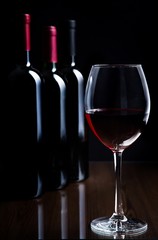 Bottles and Glass of Red Wine