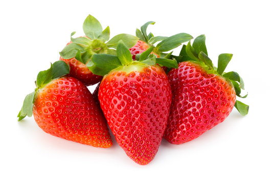 Fresh strawberries close up on white background.