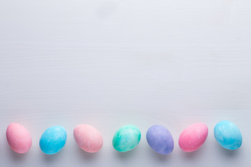 Pink pastel color tulip on the white background. Easter background.