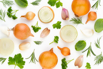 Onion and spices isolated on white background, top view. Wallpaper abstract composition of...