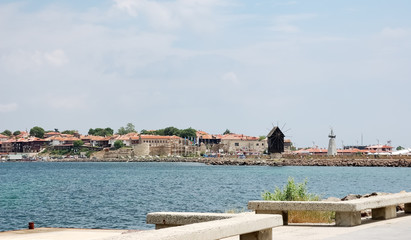 View of the bay and old Nessebar with wooden windmill.