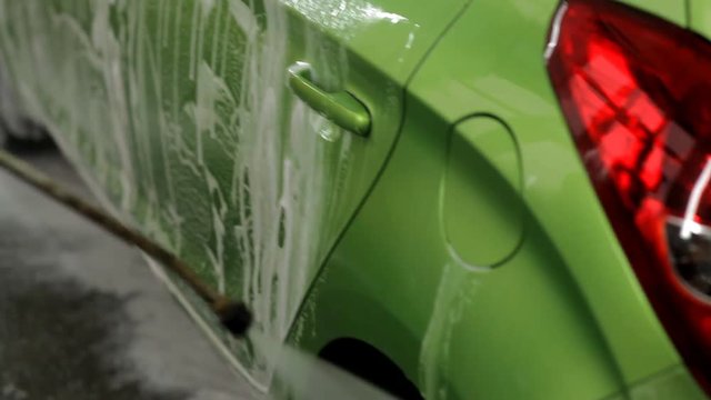 Washing the car green in a car wash