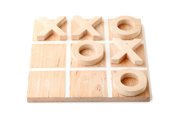 Wooden tic tac toe game isolated on white