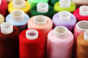 Background of colourful thread spools