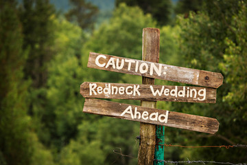 Rocky mountain redneck wedding signs