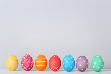 Colorful easter eggs on grey background