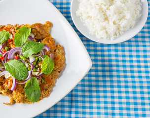 canned fish omelette and rice on table, thai food