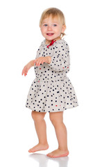 A nice little girl in a short dress.