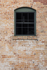 brick wall with window door