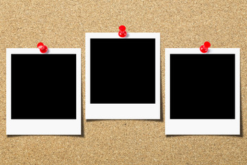 Blank photo pinned on the cork board