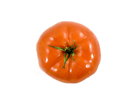 Bright red tomato from above