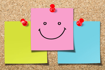 Cork board with smile sticky notes