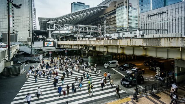 Timelapse of the people and traffic near the Osaka station, Japan