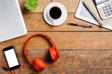 Office stuff with laptop,blank screen smart phone