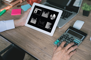 Businessman hand working with financial data