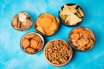 Salty snacks served in bowls