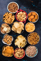 Salty snacks served in bowls