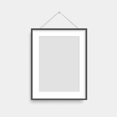 Realistic black photo frame hanging. Vector. - 196284111