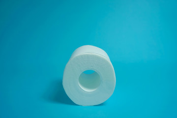 Daily necessities, Toilet paper. copy space, blue background.　日用品　トイレットペーパー　青色背景