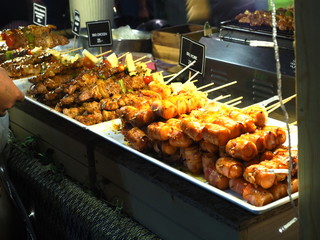 Barbecue street food have sausage ,chicken ,Beef ,pork .Have people buy.