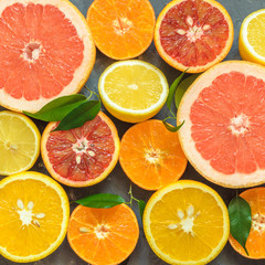 Fresh citrus fruits on table, top view.