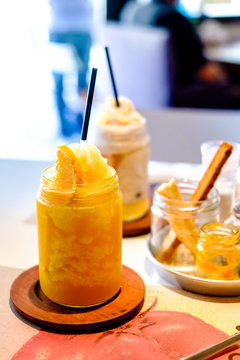 fronzen orange juice on table, in healthy food restaurant