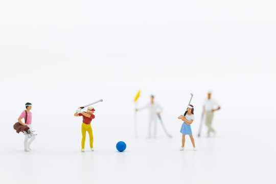 Miniature people : Businessmen spend their free time for Golf activities. Image use for sport, hobbies concept.