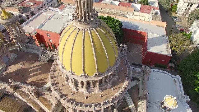 Aerial 360 shot of the yellow dome of the San Antonio de Padua Church in Aguascalientes