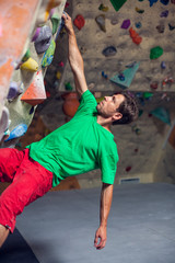 Rock climbing in the gym.