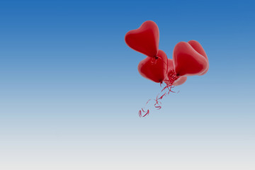 red Balloons fly on weddings in the blue sky  horizontal