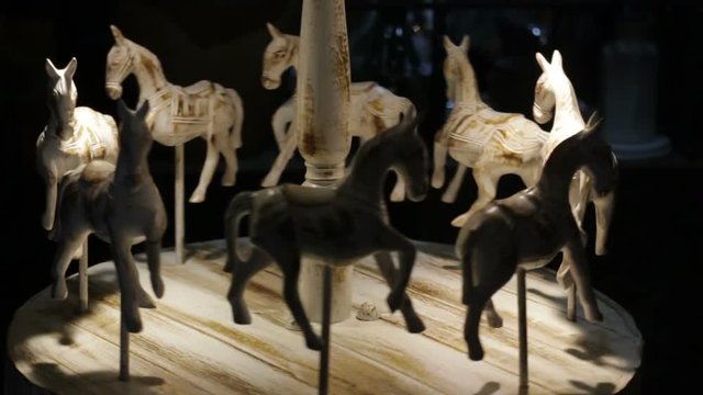 Wooden carousel horses craft toy, stock footage
