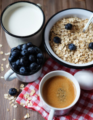 Healthy eating, food  and diet concept - tasty oatmeal with berr