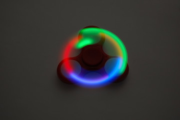 spinner, toy, glows, rotates