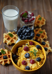 Healthy breakfast. Corn flakes with raspberries and blueberries,