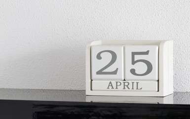 White block calendar present date 25 and month April
