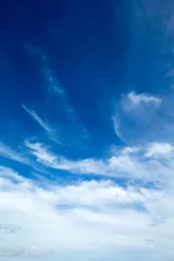 Fotobehang blue sky background with tiny clouds © Pakhnyushchyy