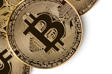 Macro shot of crypto currency gold Bitcoin coins. Isolated on white background