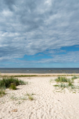 Obraz premium Sandy beach at gulf of Riga, Baltic sea.