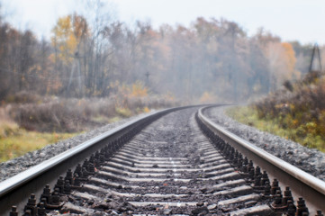Obraz premium Soft blur photos taken on the soft lens. Railroad in autumn stretches into the distance.