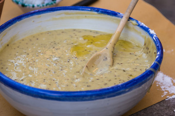 Creamy Mushrooms Sauce inside Bowl with Wooden Spoon