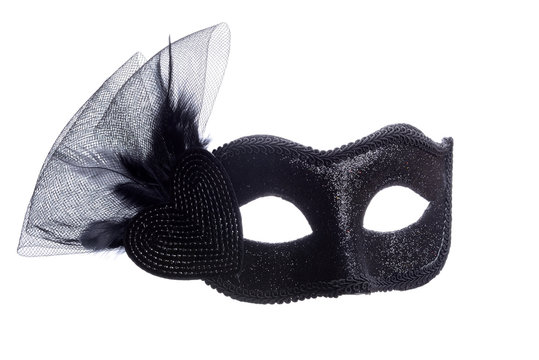 Black carnival mask isolated on white