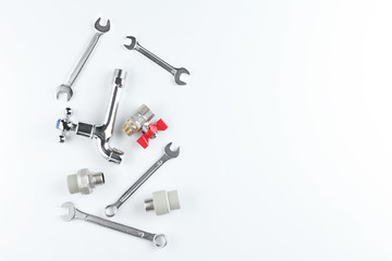 Plumber's items on white background