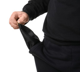 Poor man showing empty pocket on white background