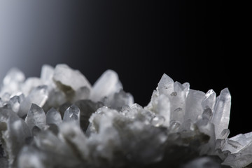 Big natural double quartz crystal isolated on white.