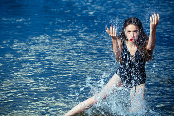 Woman swim at beach, nature, wet girl with long hair.