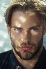 barber with unshaven face and beard.