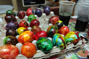 Easter eggs. Handmade painted eggs in basket for Easter celebration with art light. Easter. Colored Easter eggs. Colorful egg. Copy space. Text space. Unique handmade painted eggs